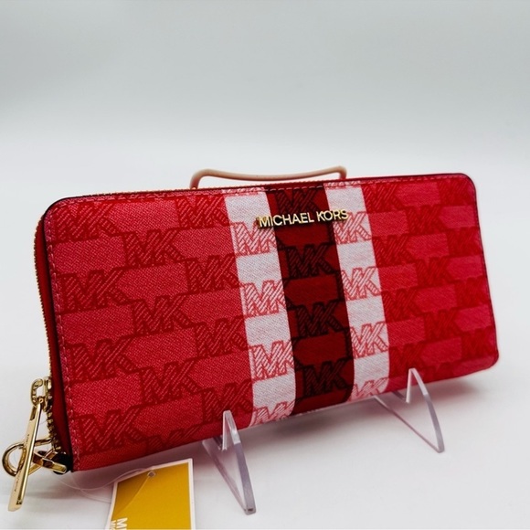 Michael Kors Handbags - Michael Kors Large Continental Wallet
Wristlet Sangria